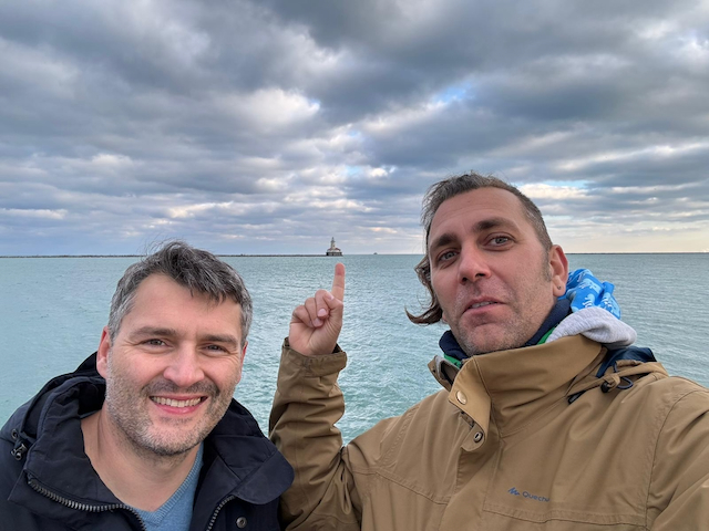 Orlin & Vadim Pointing at a Lighthouse